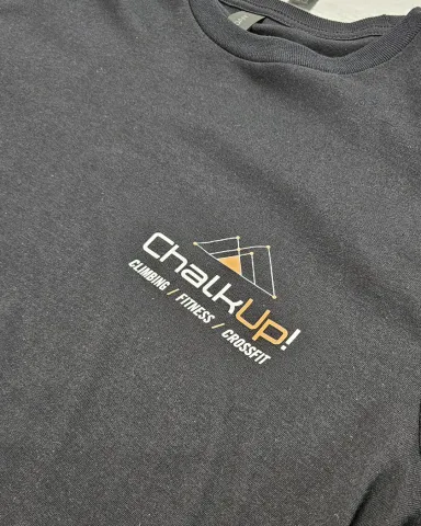 Black t-shirt with ChalkUp! logo in white and orange