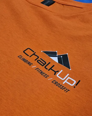Orange t-shirt showing ChalkUp! logo in black and white
